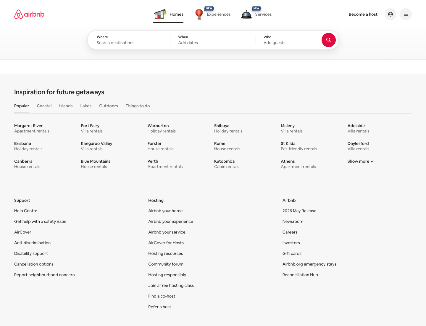 The Airbnb homepage showing the pill search bar with Where, When, Who segments and a circular Rausch search button, plus the category strip